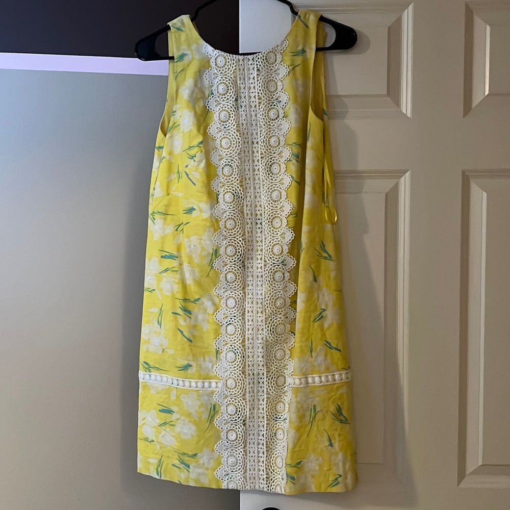 Vibrant yellow shift dress with lace detail